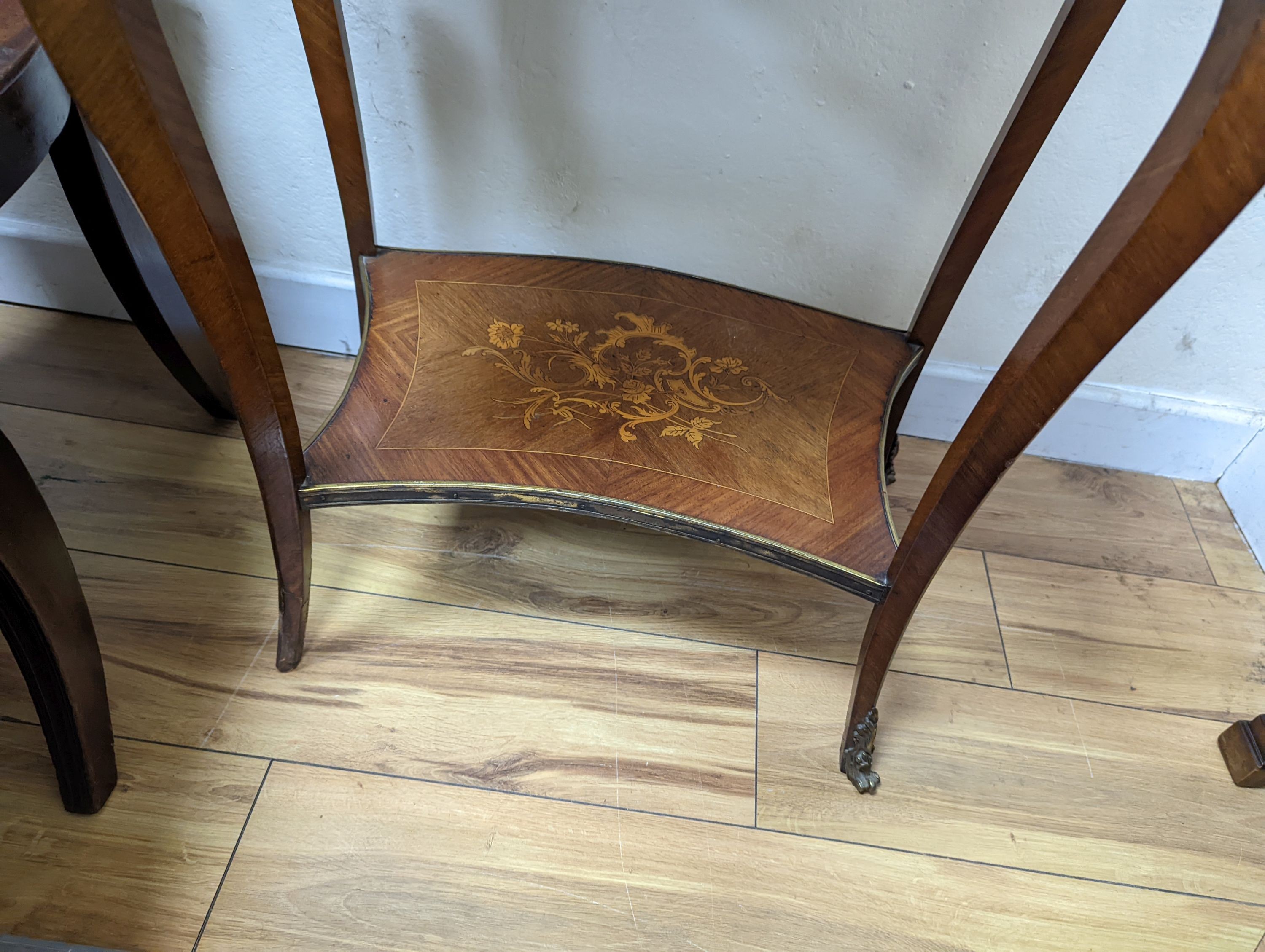 A Louis XV style Kingwood and marquetry inlaid gilt metal mounted two tier side table, width 58cm, depth 37cm, height 74cm